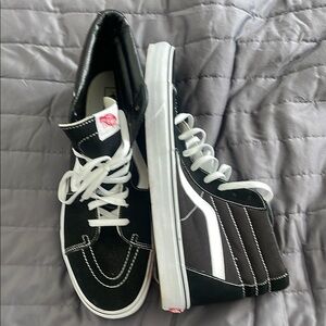 Vans Black and White High-Top Sneakers